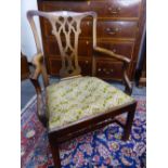 A GEORGE III MAHOGANY CHIPPENDALE STYLE NEOGOTHIC ELBOW CHAIR, THE DROP IN SEAT WITH FLOWER