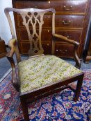 A GEORGE III MAHOGANY CHIPPENDALE STYLE NEOGOTHIC ELBOW CHAIR, THE DROP IN SEAT WITH FLOWER