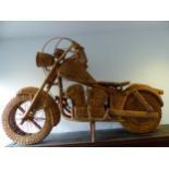 A BASKET WORK SCALE MODEL OF A HARLEY DAVIDSON, THE MOTORBIKE WITH BENT WOOD FRAME