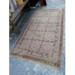 AN ANTIQUE KHOTAN RUG, 300 X 160cms