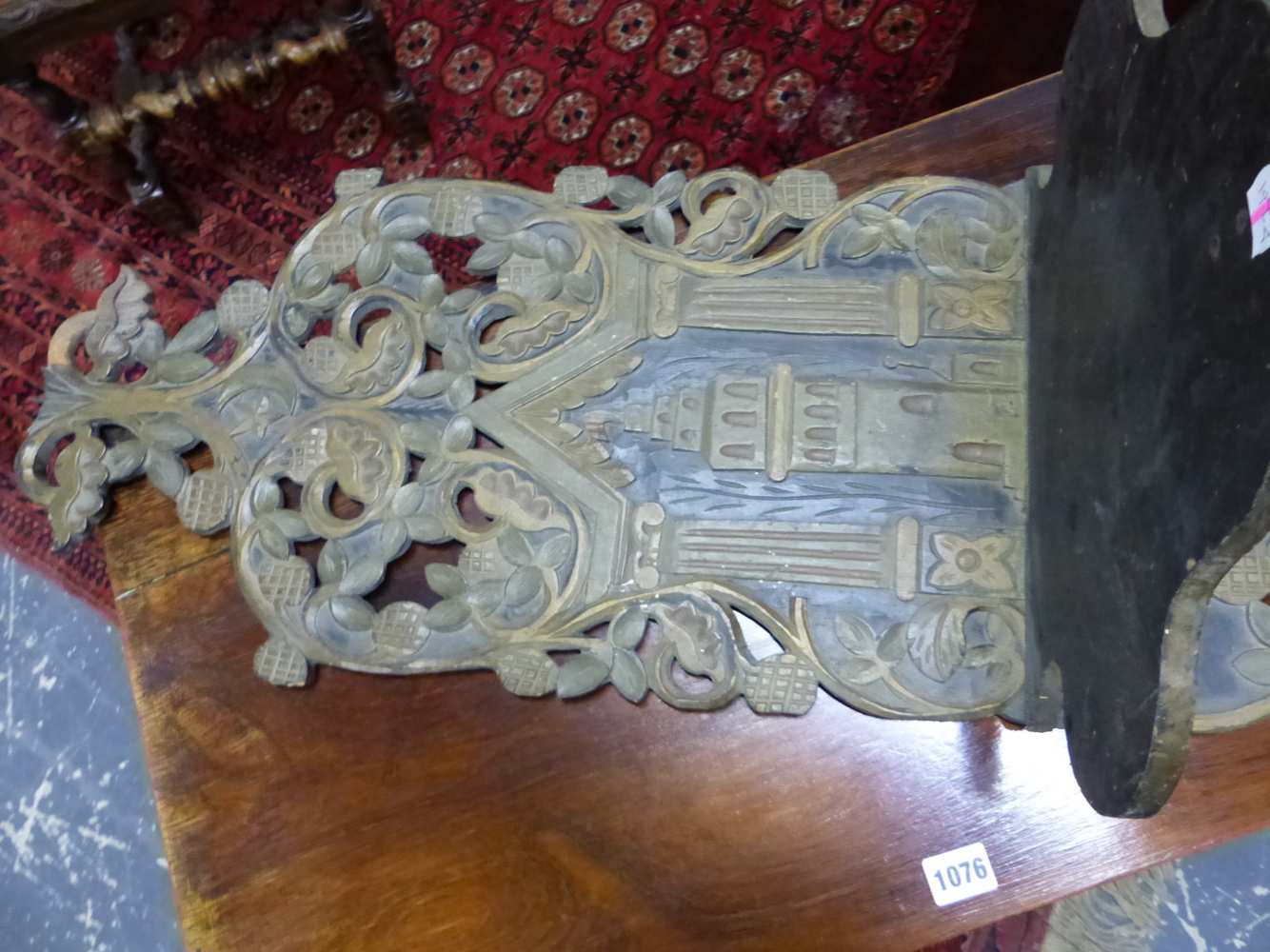 A PAIR OF TURKISH TURBAN STANDS CARVED AND PAINTED WITH FLOWERS ON A BLACK GROUND AROUND MINARETS. H - Image 4 of 5