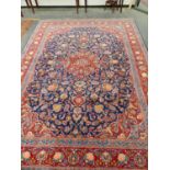 A PERSIAN KESHAN CARPET, 372 x 277cms