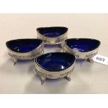 FOUR GEORGIAN SILVER HALLMARKED BLUE GLASS LINED SALTS DATED 1797 LONDON POSSIBLY FOR WILLIAM ABDY