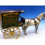 A HAND BUILT MODEL OF A BAKERS HORSE DRAWN WAGON, AND A COMPOSITION HORSE. SIGN WRITTEN F.
