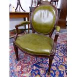 AN EARLY 19th C. MAHOGANY CHAIR, THE OVAL BACK, ELBOW RESTS AND SEAT CLOSE NAILED IN OLIVE GREEN