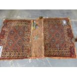 THREE ANTIQUE TRIBAL PIECES, TWO TURKOMAN BAG FACES AND AN UNUSUAL FLAT WEAVE PANEL (3)