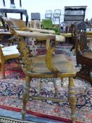 A VICTORIAN SMOKERS BOW CHAIR