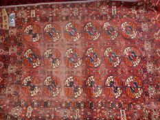 AN ANTIQUE TEKKE BOKHARA RUG, 146 x 98cms