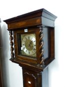 A 20th C. OAK LONG CASED CLOCK, THE BRASS DIAL WITH SILVERED CHAPTER RING FLANKED BY BARLEY TWIST