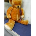 A VINTAGE JOINTED LARGE TEDDY BEAR