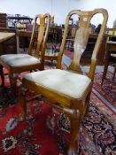 A SET OF FOUR 18th C. ELM CHAIRS WITH BALUSTER SPLATS ABOVE DROP IN SEATS AND CABRIOLE FRONT LEGS ON