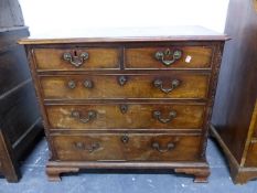 AN 18th C. MAHOGANY CHEST OF TWO SHORT AND THREE GRADED LONG DRAWERS BETWEEN GOTHIC BLIND FRET