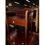 AN EDWARDIAN MAHOGANY PIANO STOOL.