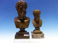 A BRONZE BUST OF MARCUS AURELIUS ON A SQUARE SOCLE AND BLACK SLATE PLINTH. H 25.5cms. TOGETHER