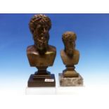 A BRONZE BUST OF MARCUS AURELIUS ON A SQUARE SOCLE AND BLACK SLATE PLINTH. H 25.5cms. TOGETHER