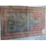 AN ANTIQUE TURKISH SILK RUG (LOSES), 137 x 116cms TOGETHER WITH AN ANTIQUE CAUCASIAN MAT, A