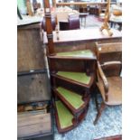 A SET OF MAHOGANY DECORATIVE LIBRARY STEPS.