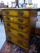 A BURR ELM CHEST OF FIVE GRADED DRAWERS ON BRACKET FEET. W 63 x D 47 x H 86cms.