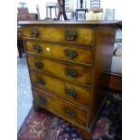 A BURR ELM CHEST OF FIVE GRADED DRAWERS ON BRACKET FEET. W 63 x D 47 x H 86cms.