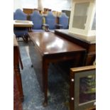 A GEORGIAN MAHOGANY DROP LEAF TABLE ON TURNED LEGS WITH CLUB FEET.