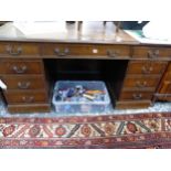 A LARGE GEORGIAN STYLE TWIN PEDESTAL DESK.