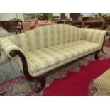 A 19th C. MAHOGANY SETTEE, THE ARCHED BACK AND SCROLL OUT ARMS UPHOLSTERED IN FLORAL STRIPED BEIGE