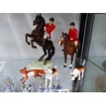 TWO BESWICK HUNTSMEN, TWO HOUNDS AND THE FOX