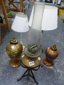 TWO KASHMIRI PAPIER MACHE PAINTED LAMPS, OIL LAMPS AND FIVE OTHERS