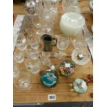 SIX VARIOUS GLASS DECANTERS, ONE HAND PAINTED WITH MATCHING SHOT GLASSES, PAPER WEIGHTS, STUART