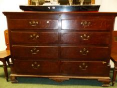 A 19th C. OAK MULE CHEST OF LANCASTER TYPE, DUMMY DRAWERS ABOVE REAL DRAWERS BETWEEN FLUTED PILASTER