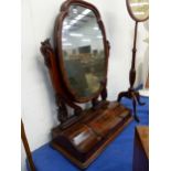 A LARGE VICTORIAN MAHOGANY DRESSING TABLE MIRROR AND A POLE SCREEN WITH NEEDLE WORK PANEL.