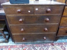 A GEORGIAN OAK CHEST OF DRAWERS.