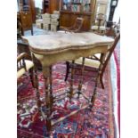 A LATE ANTIQUE MAHOGANY CROSS BANDED BURR YEW FLAP TOP TABLE OPENING ON A SINGLE GATE, THE LEGS