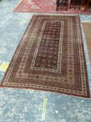 AN AFGHAN BELOUCH MAIN CARPET, 293 x 166cms