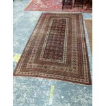 AN AFGHAN BELOUCH MAIN CARPET, 293 x 166cms