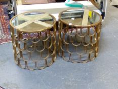 A PAIR OF LAMP TABLES, THE CIRCULAR MIRRORED TOPS ABOVE FOUR BANDS OF GILT METAL HORSESHOE SHAPES.