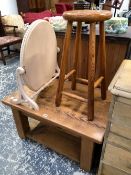 A PINE COFFEE TABLE AND A STOOL.