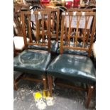 A SET OF FOUR 19th C. MAHOGANY AND INLAID DINING CHAIRS WITH LEATHER OVERSTUFF SEATS.