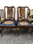 A SET OF FOUR GEORGE I STYLE MAHOGANY SPLAT BACK CHAIRS BY WARING & GILLOW.