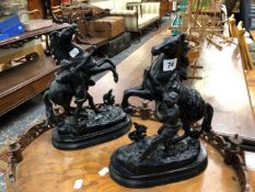 A PAIR OF ANTIQUE SPELTER MARLEY HORSE FIGURES.