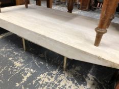 A LARGE TUFA COFFEE TABLE.