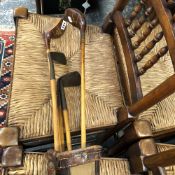 VINTAGE GOLF CLUBS IN A CANVAS AND LEATHER VINTAGE BAG.