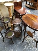 AN EDWARDIAN INLAID OCCASIONAL TABLE, A DEMI LUNE TABLE, TWO CAKE STANDS AND A JARDINIERE STAND.