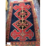 AN ANTIQUE CAUCASIAN KARABAGH RUG, 180 x 107cms.