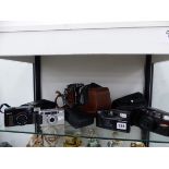 SIX CASED CAMERAS BY OLYMPUS, PENTAX AND OTHERS