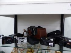 SIX CASED CAMERAS BY OLYMPUS, PENTAX AND OTHERS