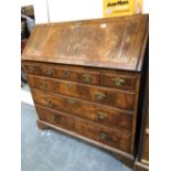 AN 18th C. WALNUT AND HERRINGBONE BANDED BUREAU.