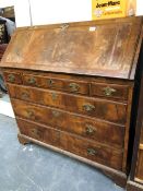 AN 18th C. WALNUT AND HERRINGBONE BANDED BUREAU.