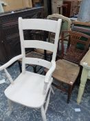 A PAINTED VICTORIAN KITCHEN ARM CHAIR AND FOUR FURTHER CHAIRS.