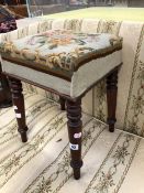 A VICTORIAN MAHOGANY STOOL WITH TAPESTRY UPHOLSTERED COVER.
